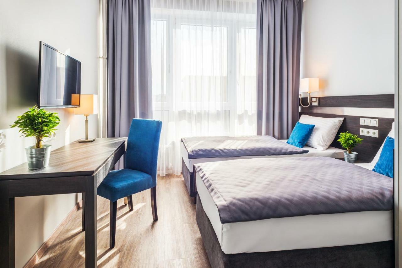 Arktur City Hotel Berlim Exterior foto